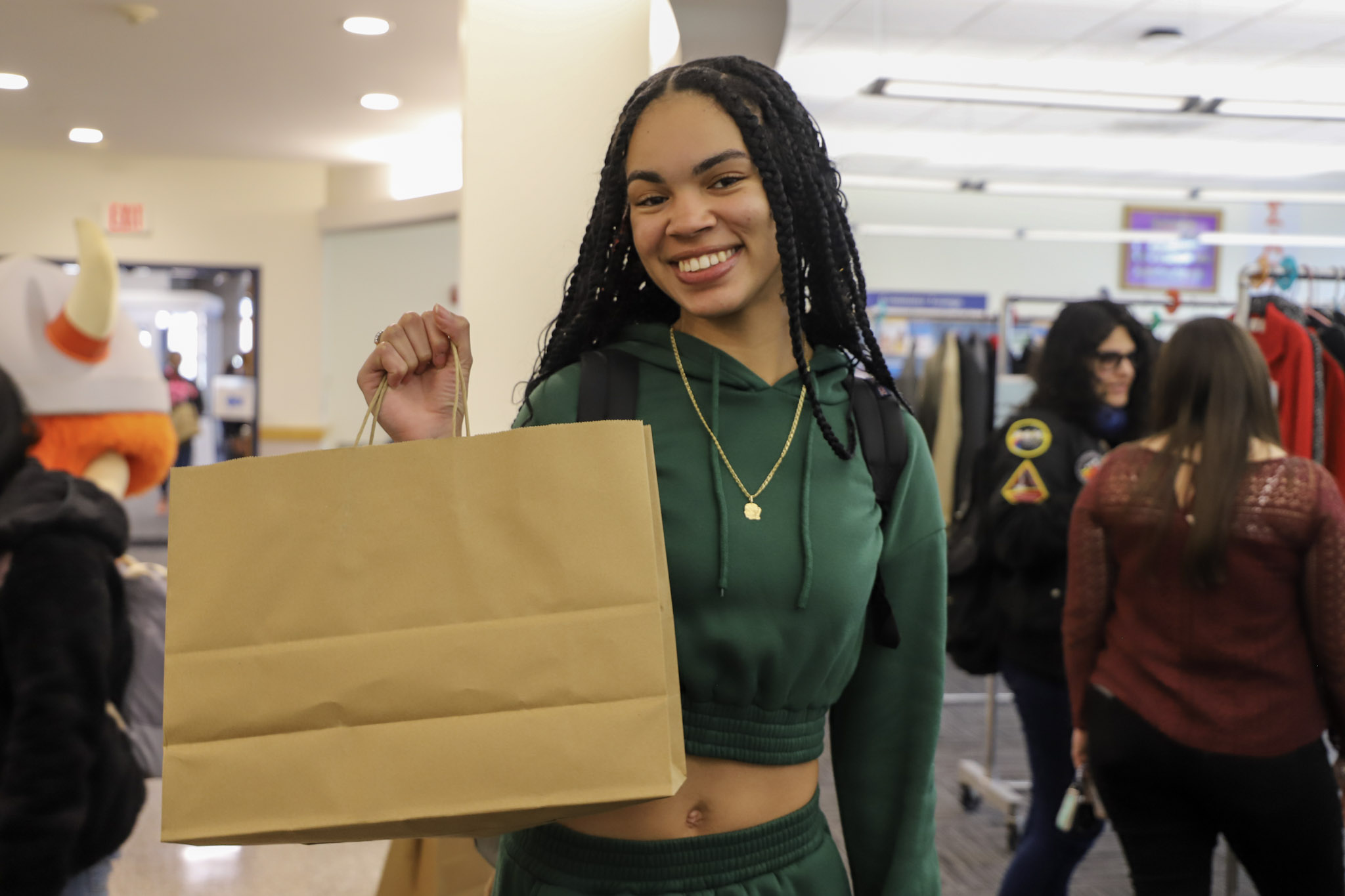 Individual with a shopping bag