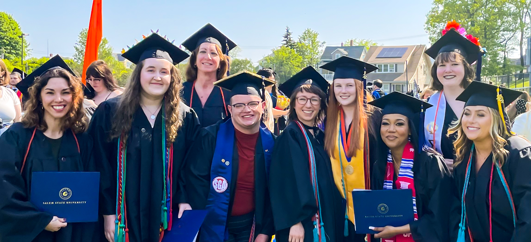 2022 Salem State sociology graduates pose for a photo.