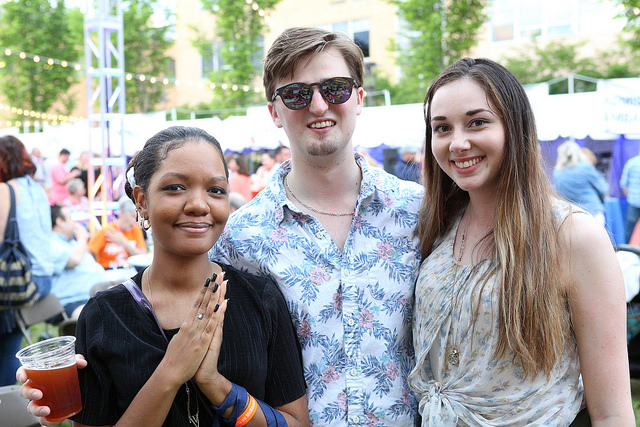 A group of young alumni at the Party on McKeown Plaza