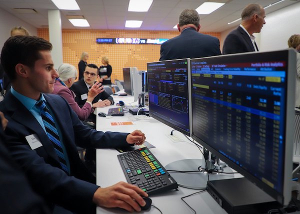 A student at a computer in the Cabot Wealth Management Lab