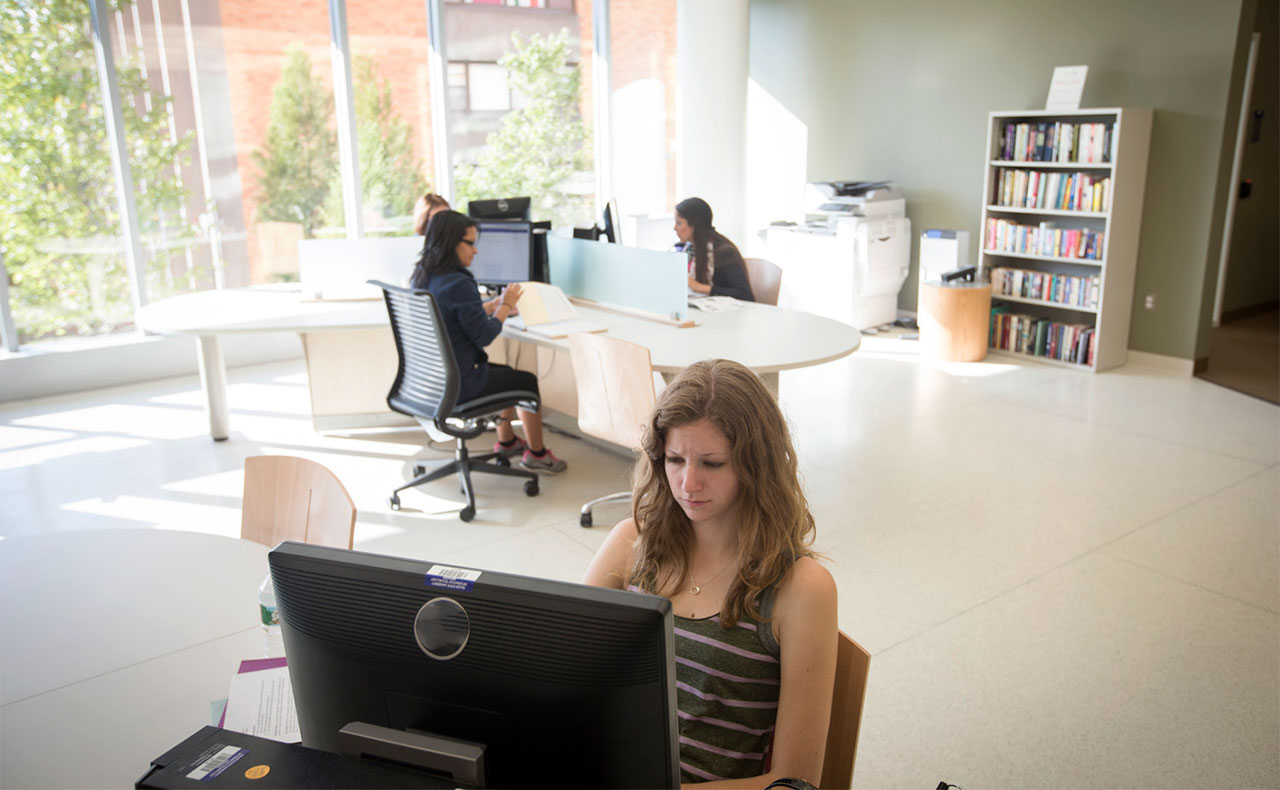 students at library computers