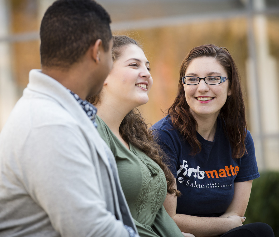 Three students on the quad