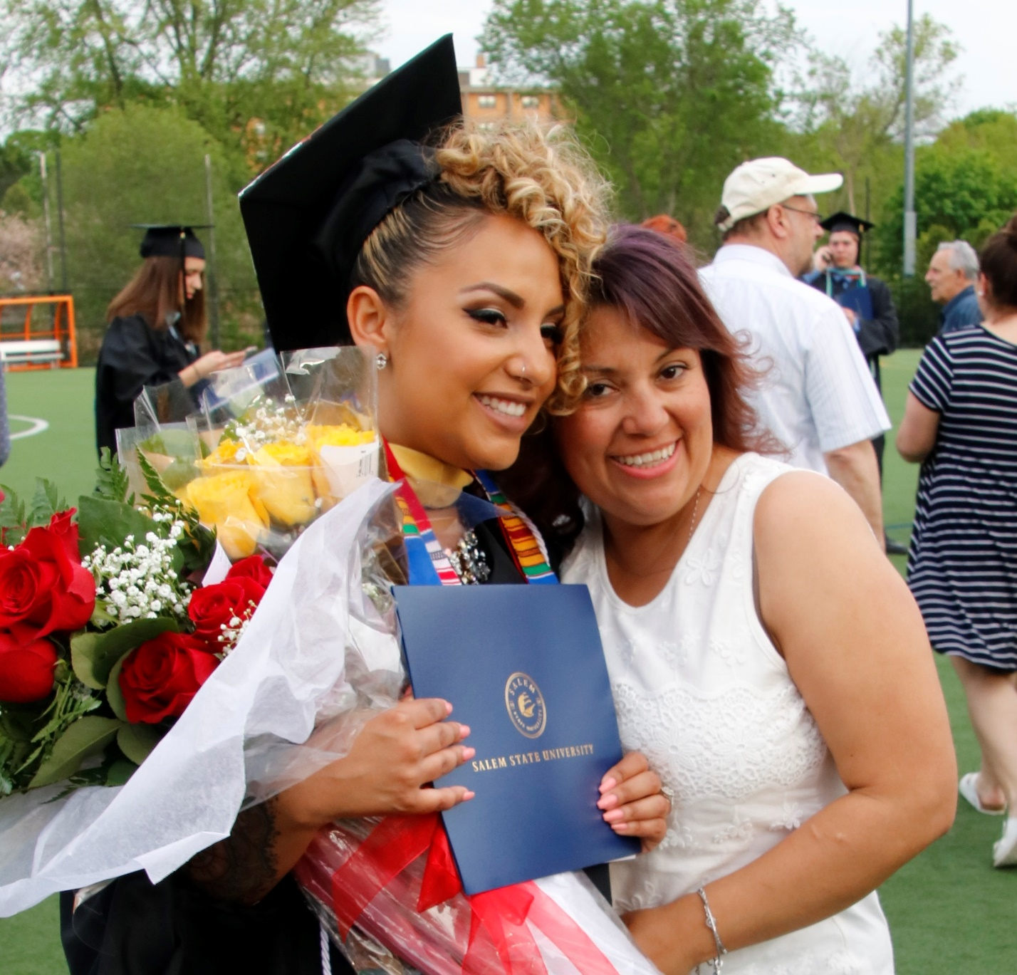 Graduate and parent at commencement