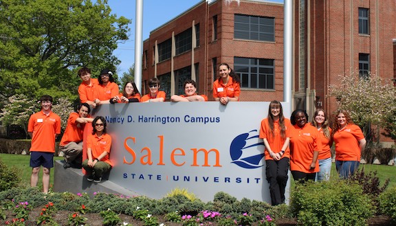 Group of Orientation Leaders posing with the Harrington Campus SSU sign