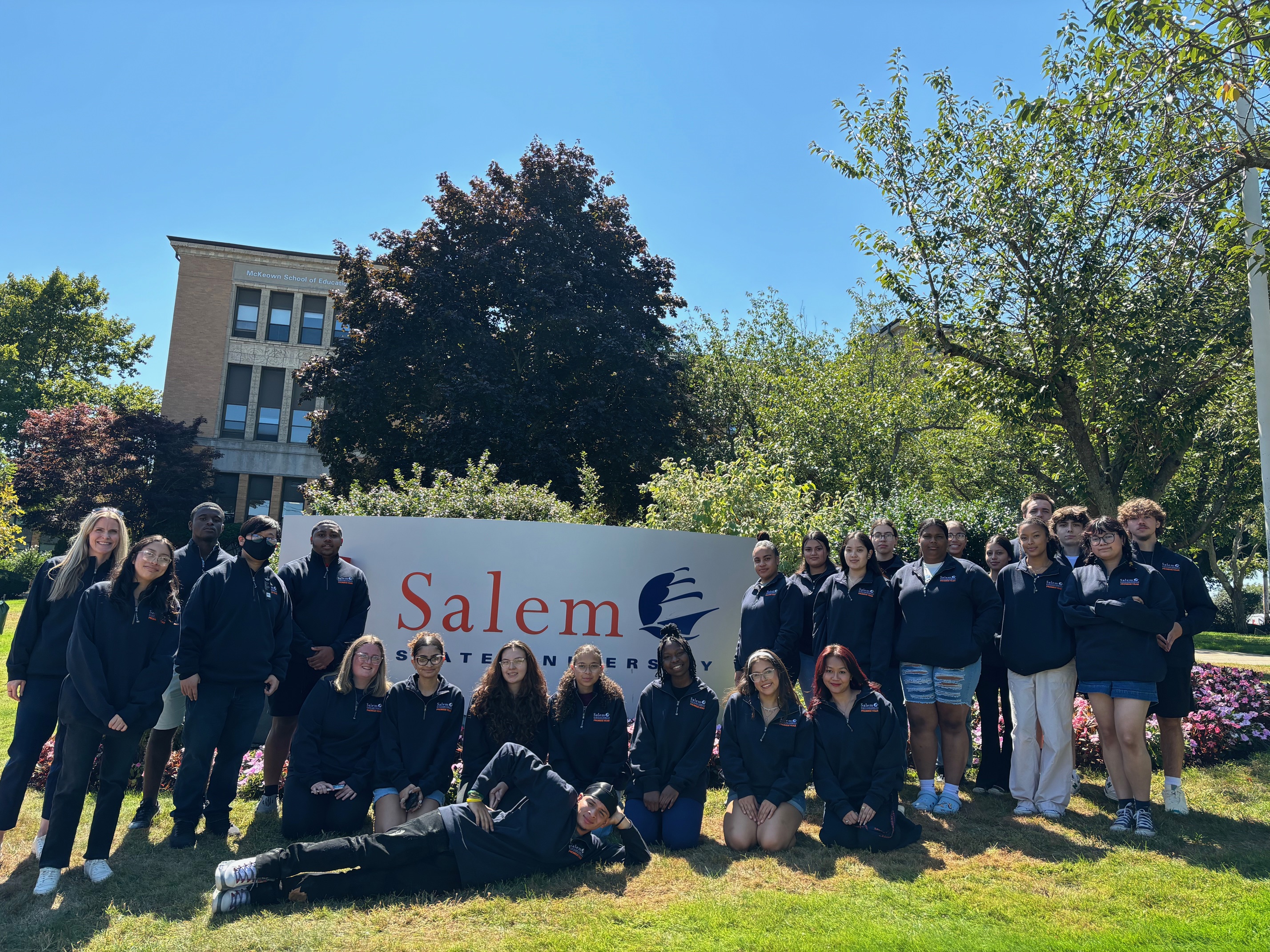 Promise Year students with the Salem State University sign