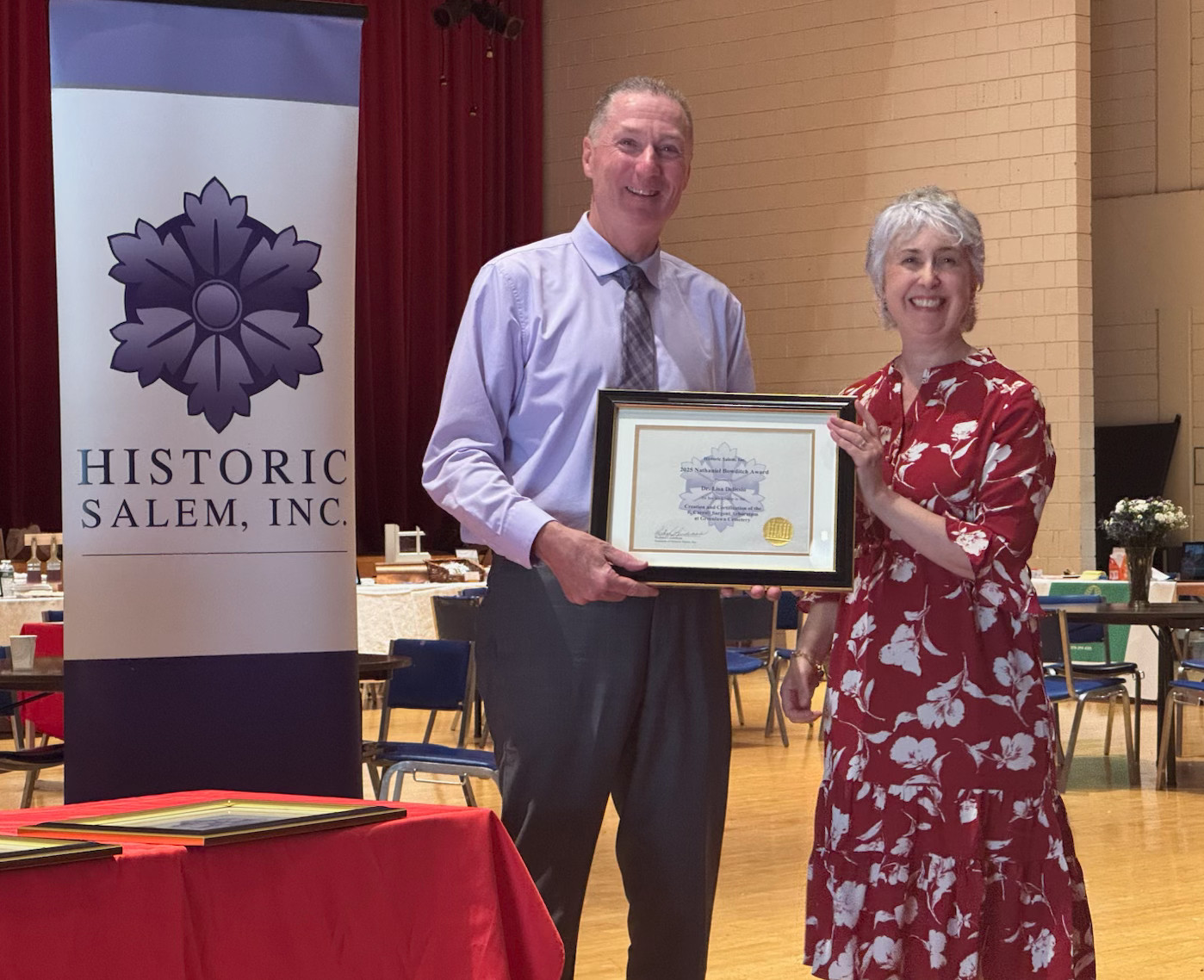 Lisa Delissio receives HSI award from Essex County District Attorney Paul Tucker