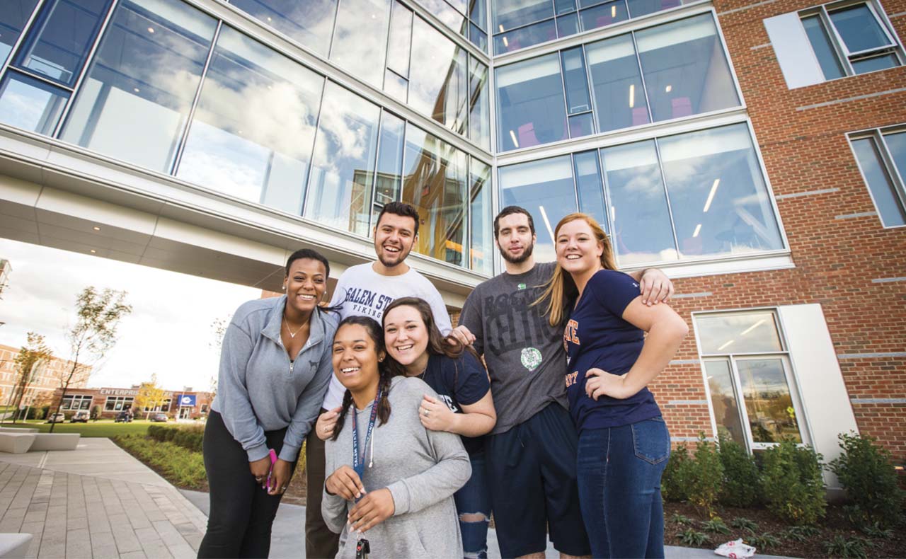 A group of excited students huttled together at Viking Hall