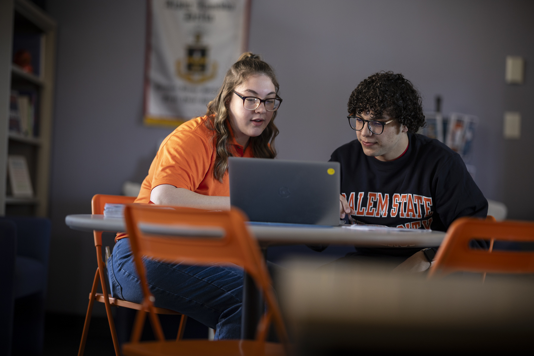 Student getting support services in Salem State gear. 