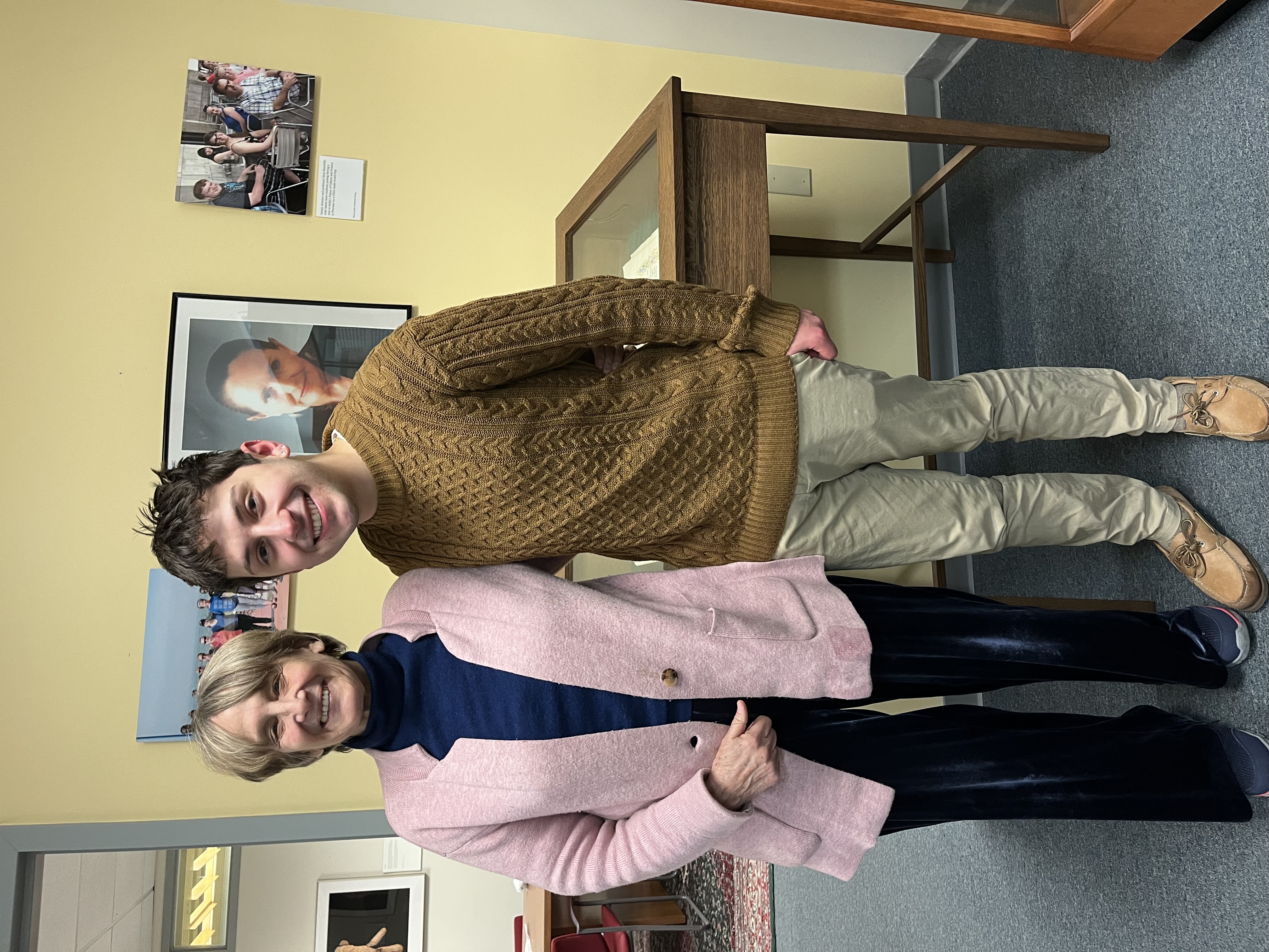 Andrea and Zach stand next to each other 