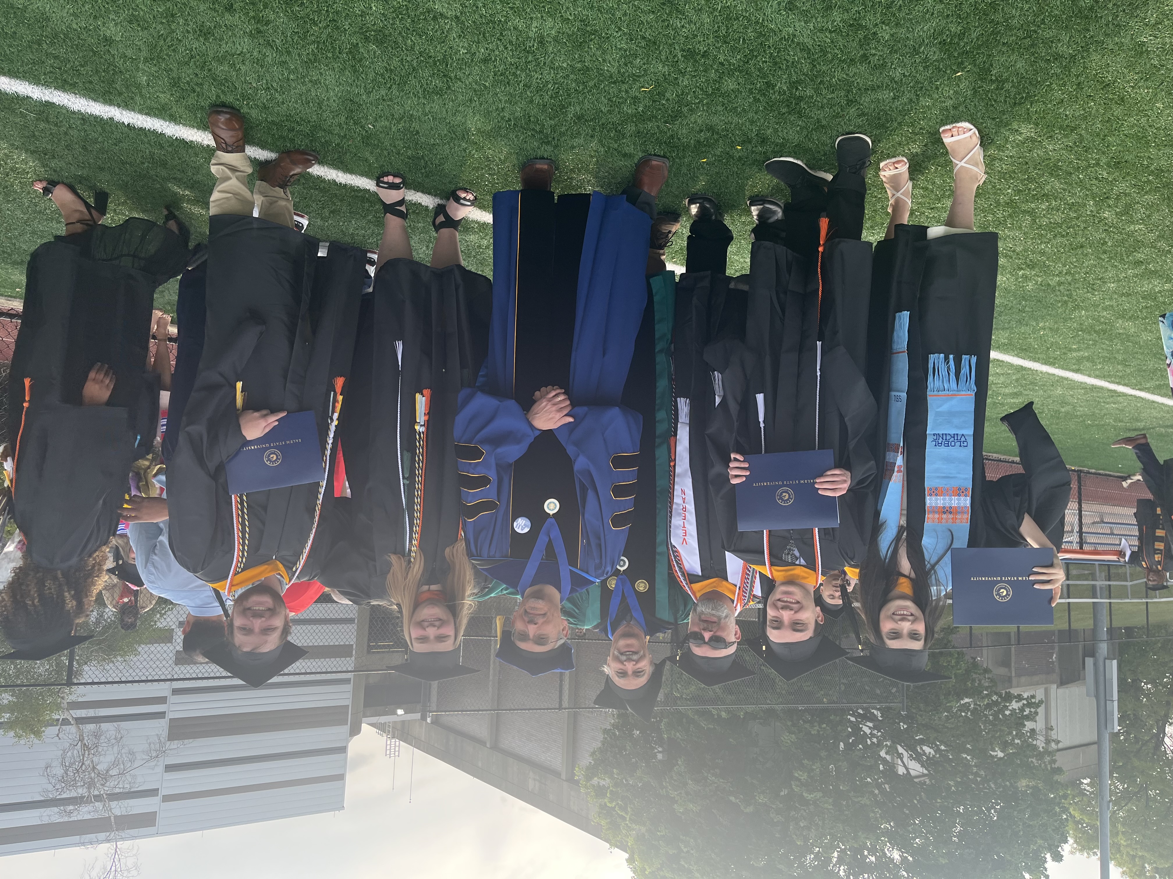 Commencement 2023 with GIS graduate students Natasha Farina, Evan Greenberg, Mi…