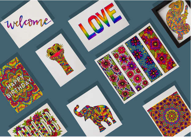 A variety of brightly colored pictures including a birthday card and elephant
