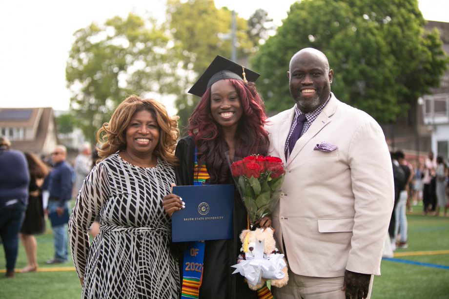 Graduate and family members pose together after ceremony