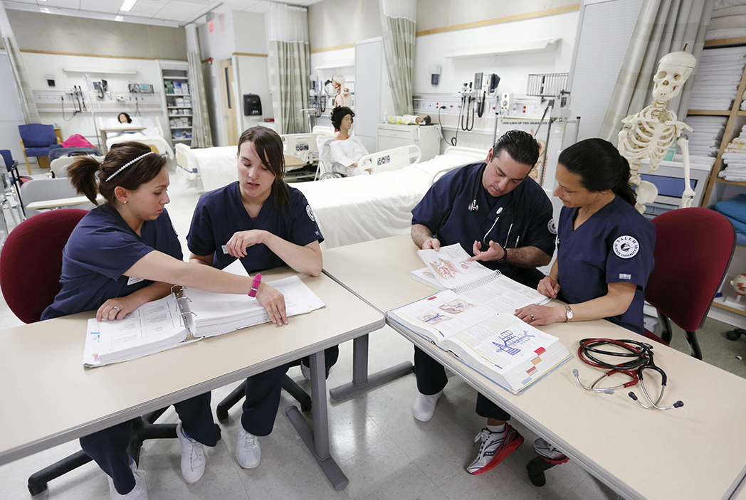 Students working in the nursing lab. 