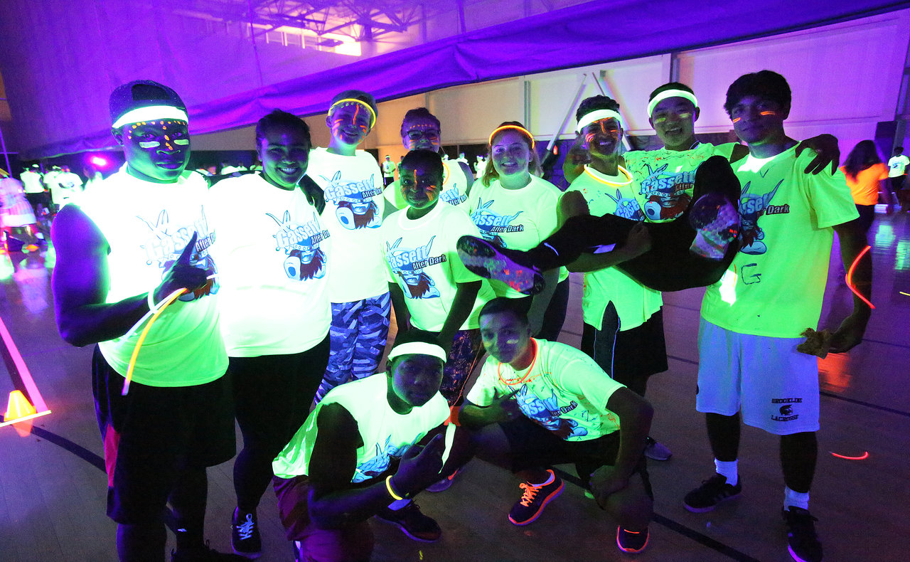 Students play glow in the dark dodgeball.