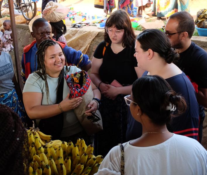 SSU students shopping in the Rubona open market during a visit to Rwanda