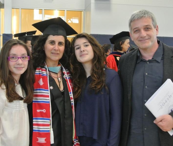 Marta García ’14G at Salem State’s 2014 Commencement with daughters, Jimena Pueyo-García and Claudia Pueyo-García ’22 and husband, Javier Pueyo