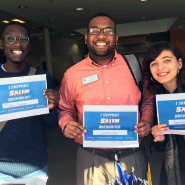 Students with "I support Dreamers" signs