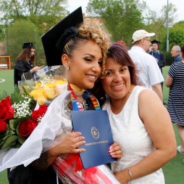 Graduate and parent at commencement