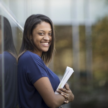 Student outside the Berry Library