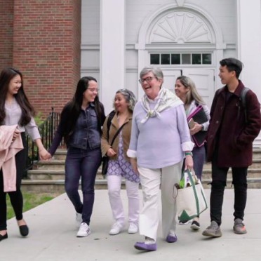 ALCI students and faculty walking outside