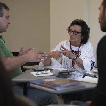 Woman in student group discussion