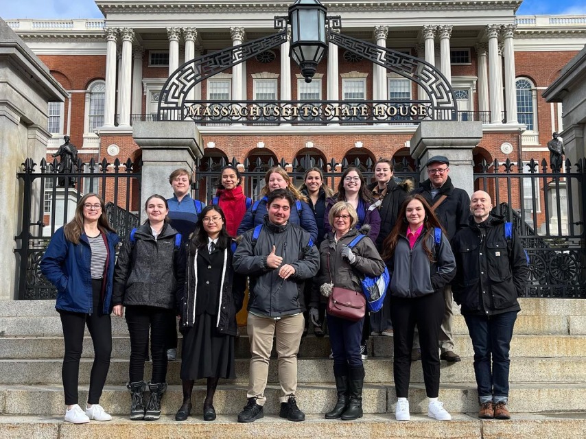 Salem State students stand in front of the Boston Capital building
