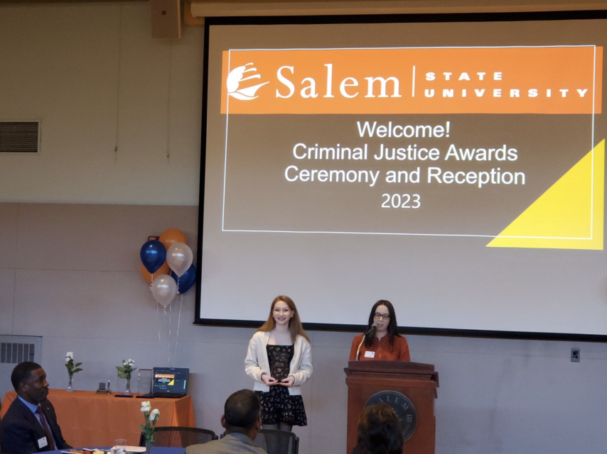 A student receives an award at the Criminal Justice Awards Ceremony.