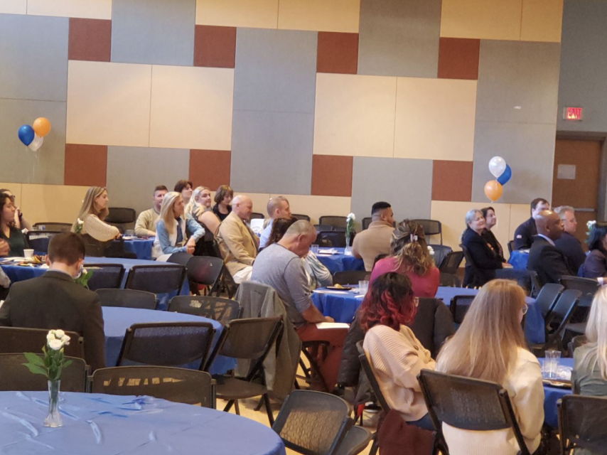 Attendees at the 2023 Criminal Justice Awards at Salem State sit at tables.