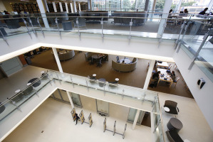 inside library, at top of central stairs, looking down into lobby