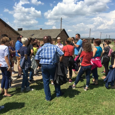 Students outside touring the Auschwitz concentration camp