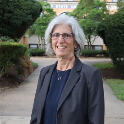 Dean McCarty pictured in front of the Sullivan Building, home of the McKeown School of Education