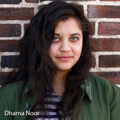 A headshot of Dharna Noor, the Boston Globe's climate producer
