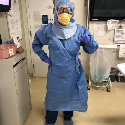 Ashley Alexander, Lahey Hospital RN and 2016 Salem State Nursing Graduate, wearing hospital scrubs and a mask.