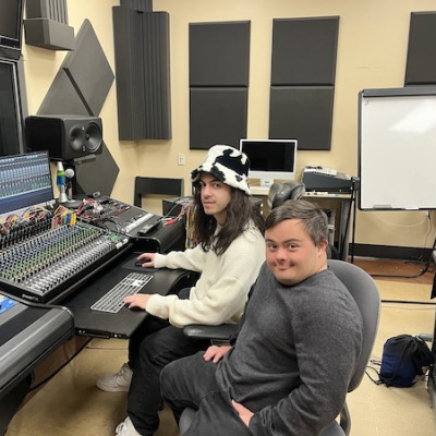 Two CIS students in a recording studio