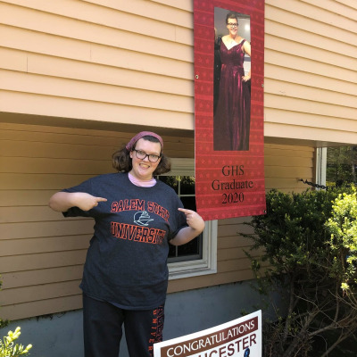 Inclusive Scholars student with Salem State shirt.