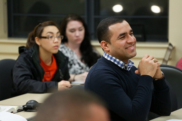 Students smiling in a classroom