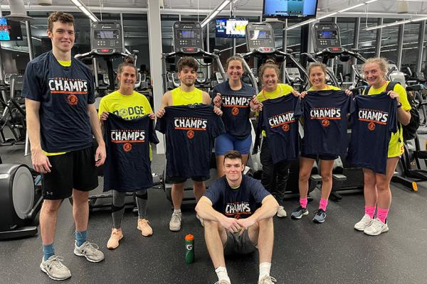 A group of intramural sports champions with their celebratory t-shirts