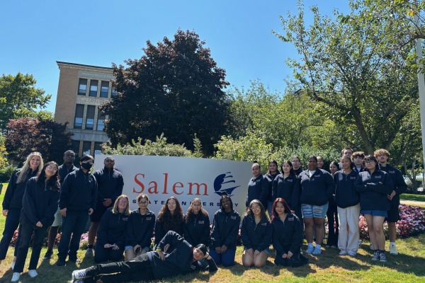 Promise Year students with the Salem State University sign