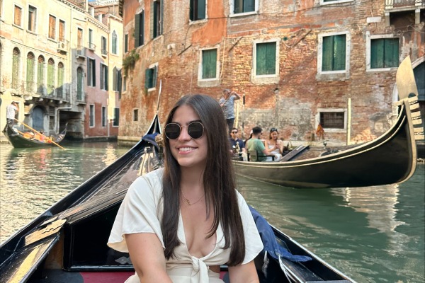 A student riding in a gondola