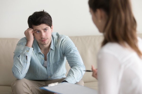 A student sits with the counselor for a discussion.