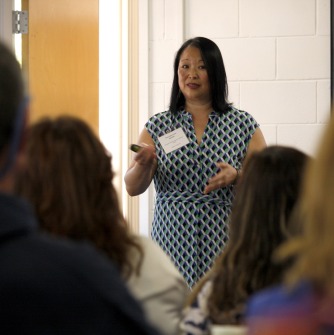 Maria Dykema Erb, director of Boston University's Newbury Center, speaks to attendees of the First-Generation Success Symposium.