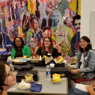 Image of people at in-person orientation from previous year