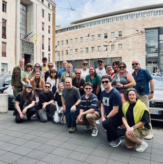 Salem State students, faculty, and others pictured in front of Italy's Palazzo delle Poste