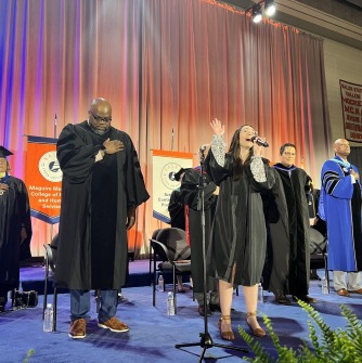 Student singer at commencement 2024