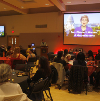 Elizabeth Warren speaks to TRIO graduates at TRIO's 50th annual celebration