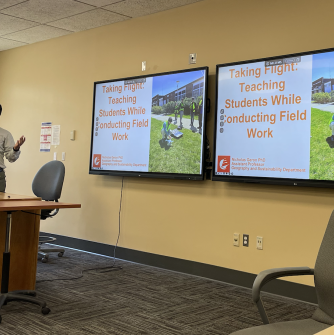 Nick Geron presenting at the 2024 symposium