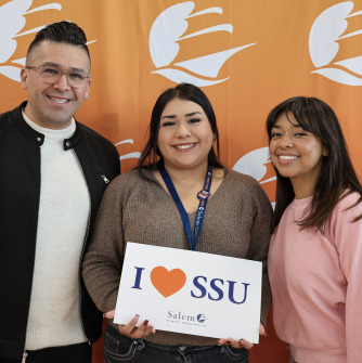 Students with I love SSU Sign