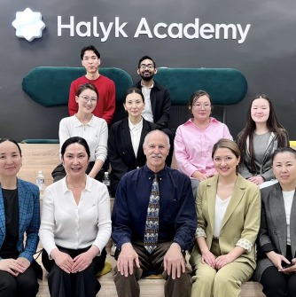 Professor Young with faculty and graduate students after a lecture