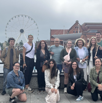 A group photo of the students and faculty traveling to the Baltics, here pictured in Gdańsk, Poland