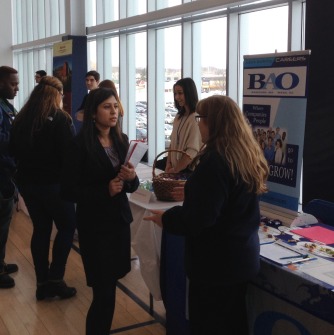 Student speaking to recruiter at the Job and Internship Fair